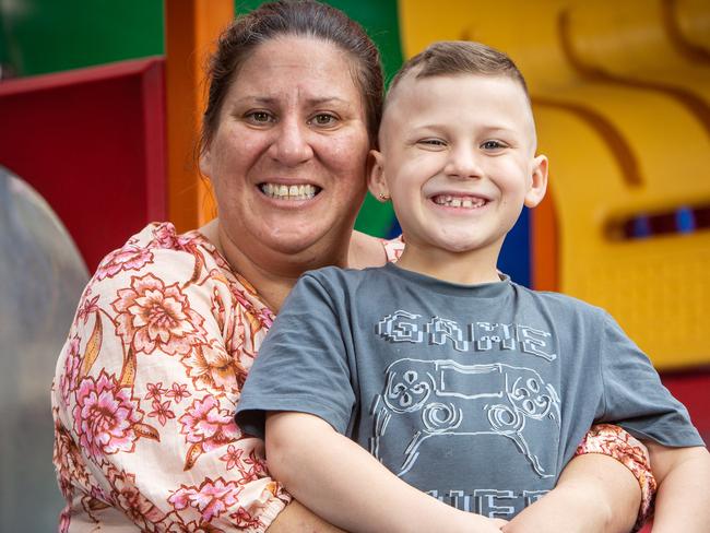 ADELAIDE, AUSTRALIA - Advertiser Photos MARCH 9, 2023: Eight-year-old Harrison and his Mother, Paula, in the WomenÃs and ChildrenÃs Hospital playground. Harrison suffered a traumatic brain injury in December 2022 in Darwin. Picture Emma Brasier