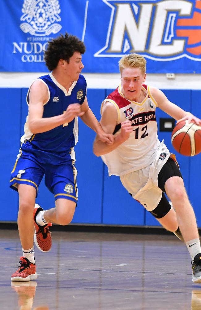 Carlisle defending Kailan Sales earlier in the season. Nudgee College V BSHS in Basketball Saturday August 20, 2022. Picture, John Gass