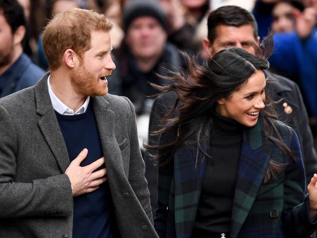 Harry and meghan Markle were swamped by fans in Edinburgh. Picture: Jeff J Mitchell/Getty Images