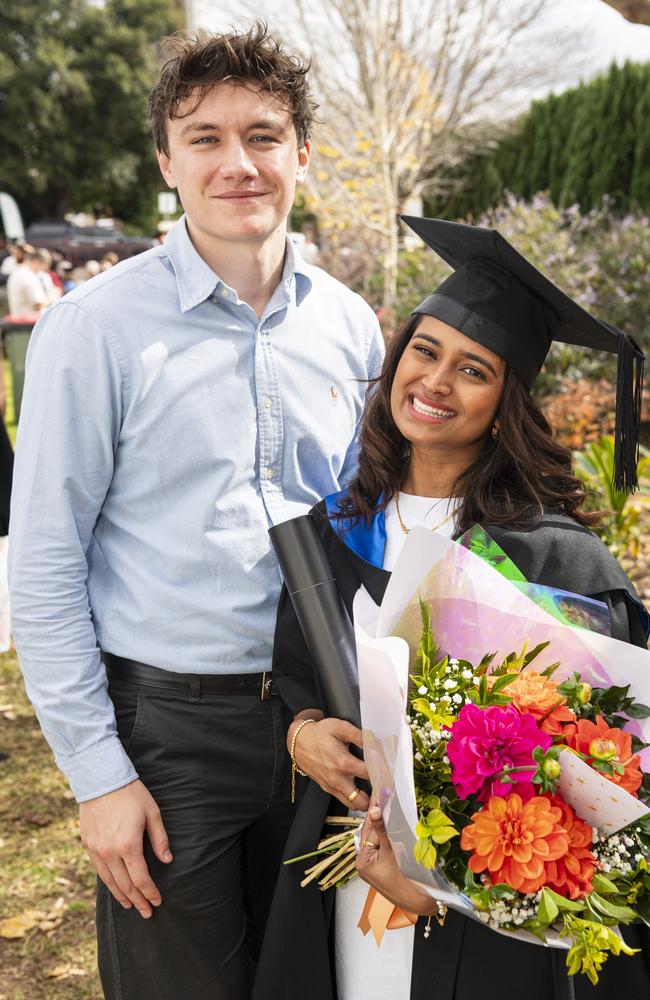 Valedictorian and Master of Clinical Psychology graduate Shameta Siva celebrates with Curtis Green at a UniSQ graduation ceremony at The Empire, Tuesday, June 25, 2024. Picture: Kevin Farmer