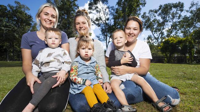 The future is looking brighter in Clermont as young mums Jade Hallman with Hendrix 18 months, Mardi Bush with Harriet 2, and Jess Lonergan with Fletcher 2, see a future for a young generation in the Adani mine approval as 'every family has a link to mining in this town'. Picture: Lachie Millard