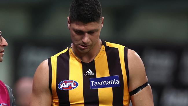 SYDNEY, AUSTRALIA - JULY 10: Jonathon Patton of the Hawks leaves the ground with an injury during the round 6 AFL match between the Collingwood Magpies and the Hawthorn Hawks at GIANTS Stadium on July 10, 2020 in Sydney, Australia. (Photo by Ryan Pierse/Getty Images)