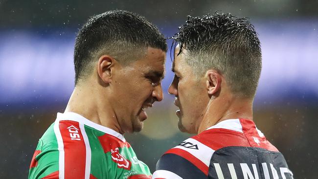 SYDNEY, AUSTRALIA - MARCH 15: Cody Walker of the Rabbitohs and Cooper Cronk of the Roosters face off during the round one NRL match between the Sydney Roosters and the South Sydney Rabbitohs at Sydney Cricket Ground on March 15, 2019 in Sydney, Australia. (Photo by Mark Kolbe/Getty Images)