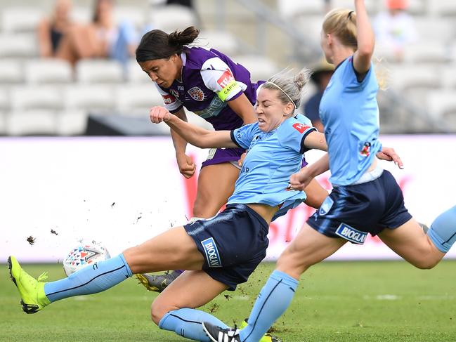 Perth Glory’s Sam Kerr is tackled by Sydney FC’s Alanna Kennedy during the W-League grand final on Saturday. Picture: AAP 