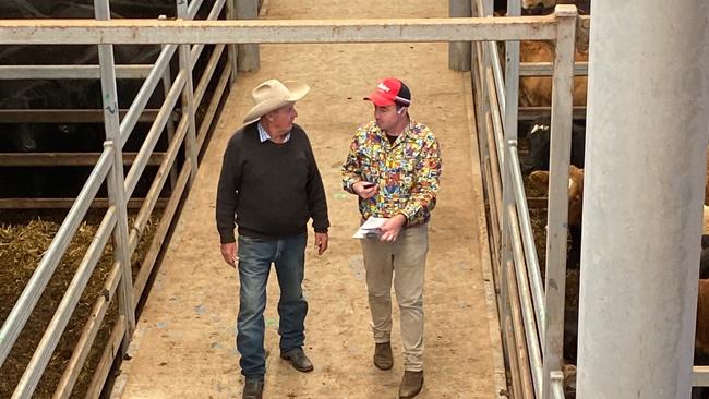 Agents donned Trademutt bright shirts to try to prompt conversations about mental health at the Wodonga store cattle sale.