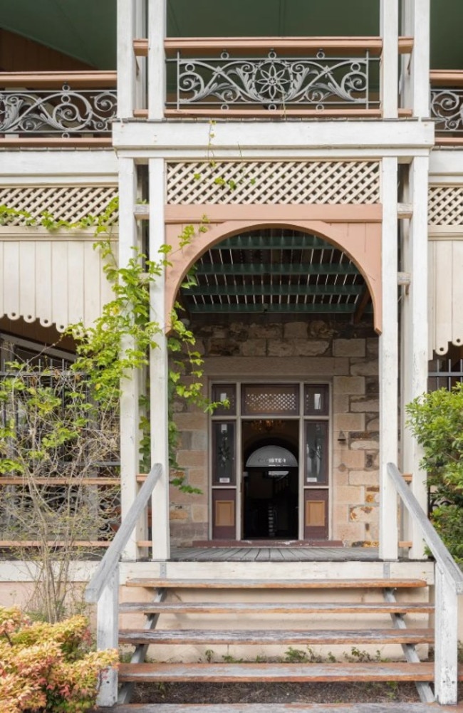The homestead's walls are built from chiselled sandstone blocks.