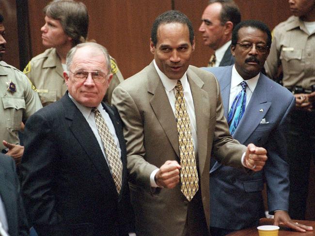 O.J. Simpson reacts as he is found not guilty of the murders of his ex-wife Nicole Brown Simpson and her friend Ron Goldman in 1995.