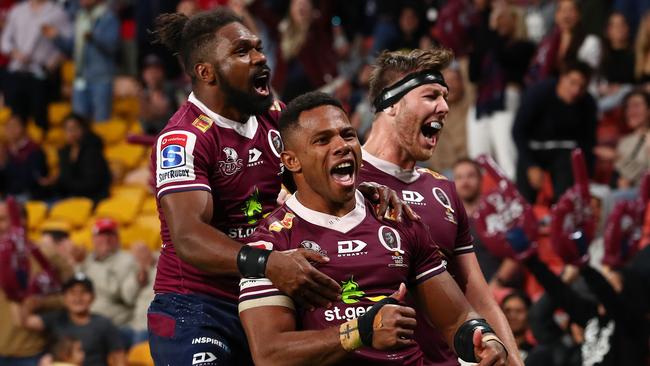 Daugunu (centre) celebrates his try. Picture: Getty Images