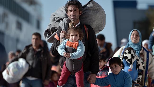 Middle Eastern asylum-seekers in the Greek port of Piraeus in 2016. Picture: AFP