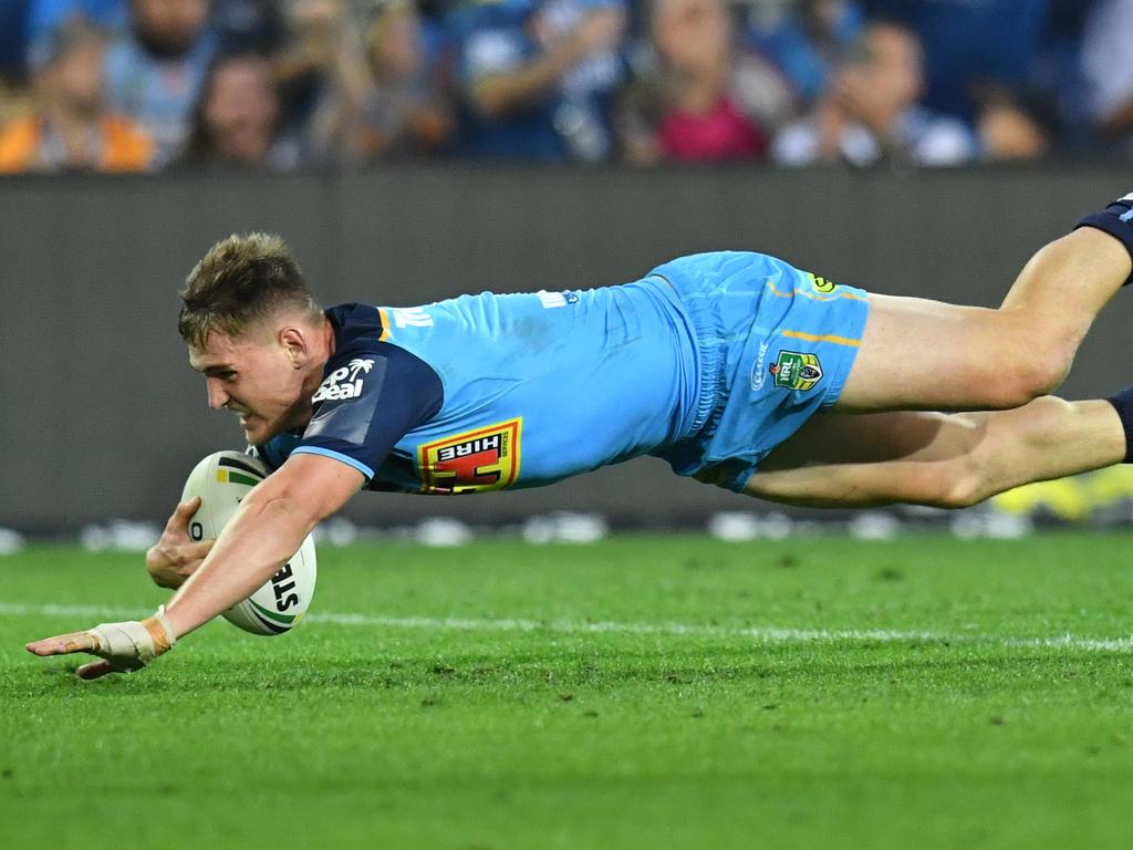 AJ Brimson of the Titans scores a try during the Round 25 NRL match between the Gold Coast Titans and the North Queensland Cowboys at Cbus Super Stadium on the Gold Coast, Saturday, September 1, 2018. (AAP Image/Darren England) NO ARCHIVING, EDITORIAL USE ONLY