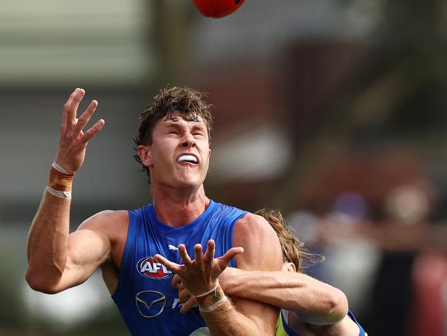 Charlie Comben in action at North Melbourne training. Picture: Michael Klein