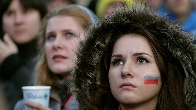 Russian fans watch the match on a big screen. It did not end well for them.