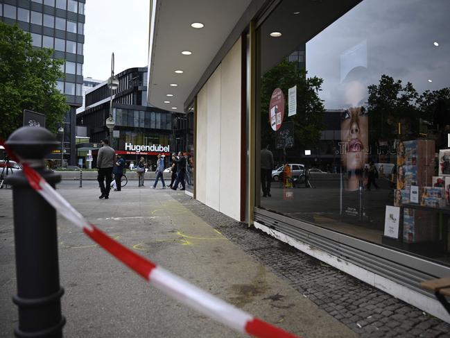 The store the man ploughed into is boarded up. Picture: AFP