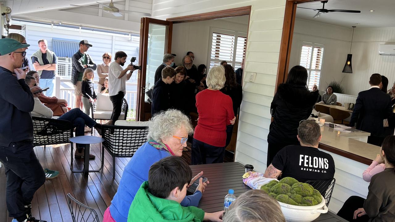 Dozens within and outside the community gathered to see what the hot property would sell for. Picture: Nicholas Finch