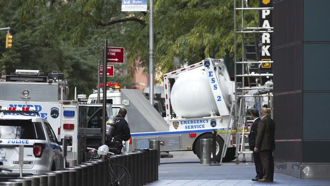 An NYPD bomb squad vehicle departs an area outside Time Warner Center. Picture: AP