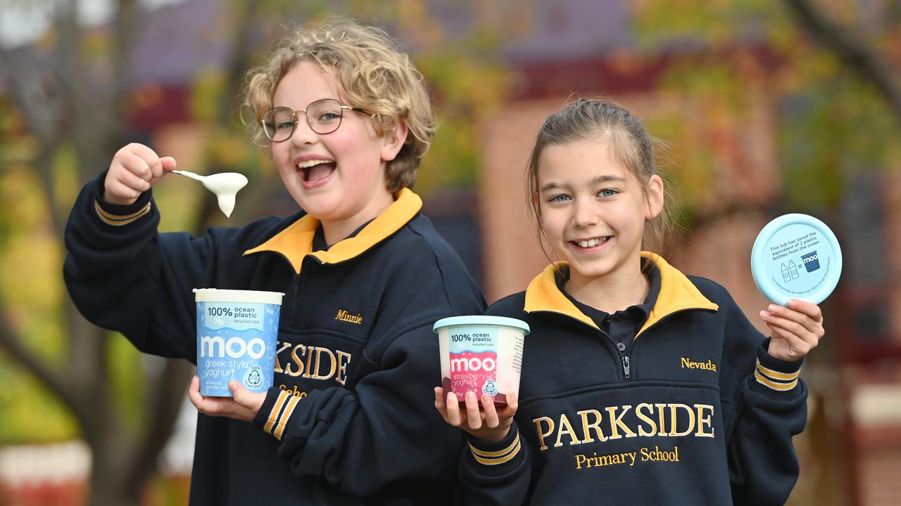 Minnie Sanders, 11, and Parkside Primary school classmate Nevada Maio, 11, are proud questions asked at a careers day at their school led MOO yoghurt to create environmentally friendly tubs and lids using 100 per cent recycled plastic washed up on beaches. Picture: Keryn Stevens