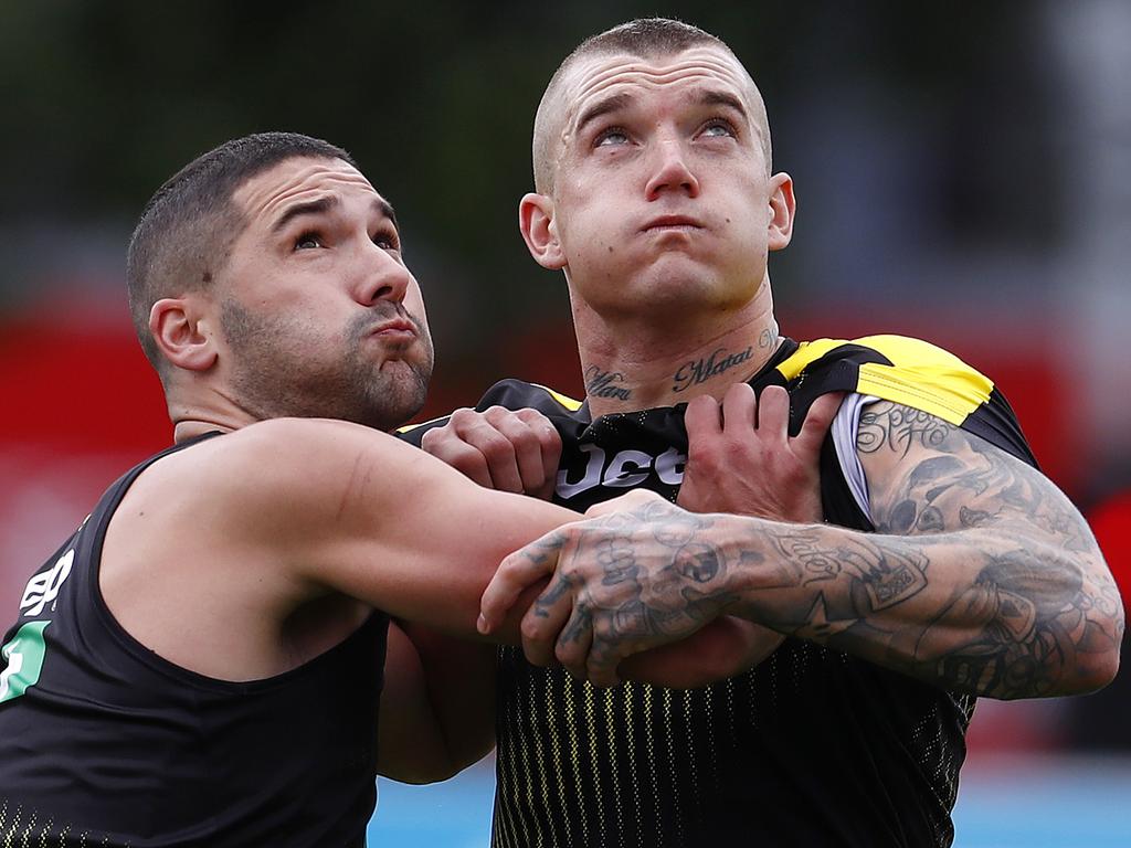 Richmond premiership player Shaun Grigg (left) says ruckwork can sometimes be less physically draining for midfielders than jostling for position at stoppages. Picture: Michael Klein