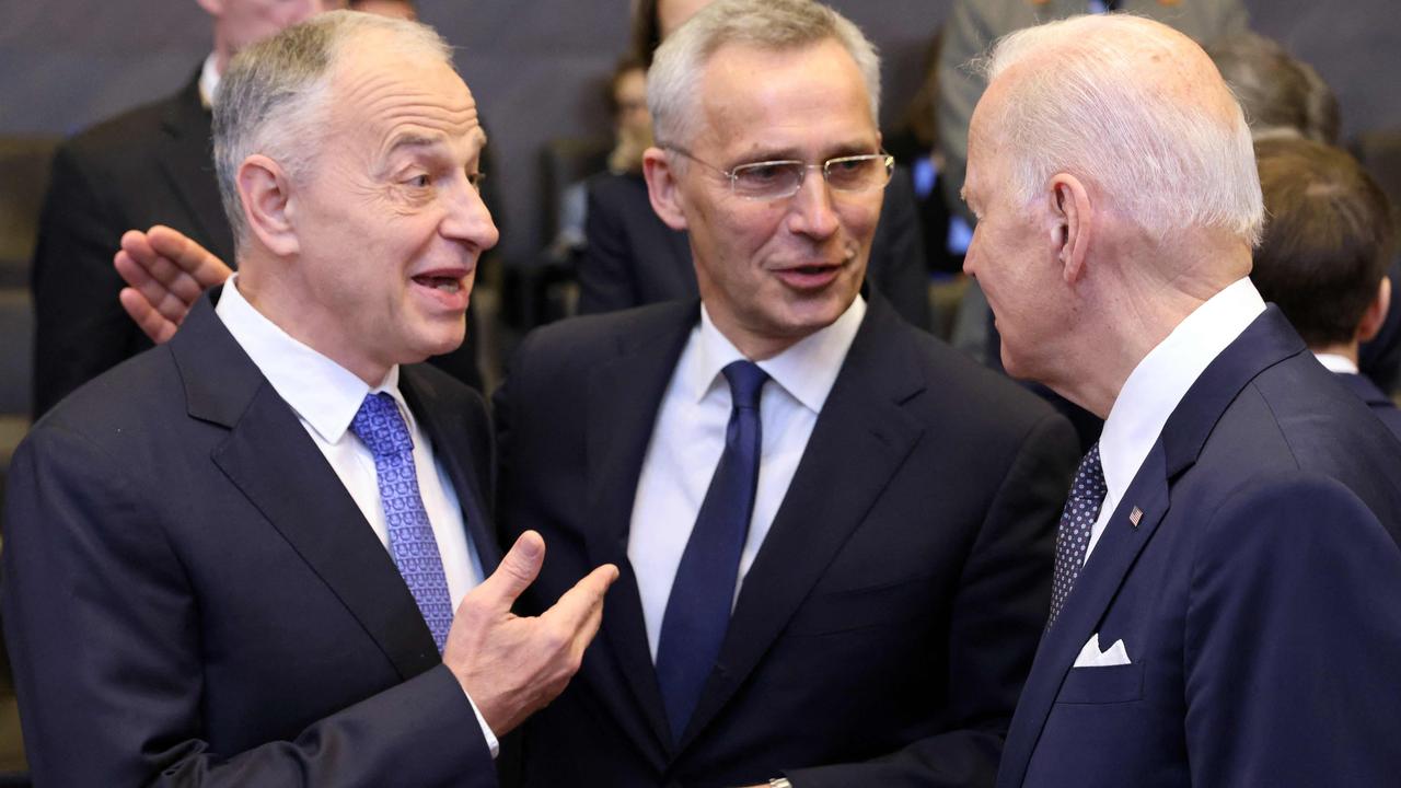 (L/R): NATO deputy Secretary-general Mircea Geoana, NATO Secretary General Jens Stoltenberg and US President Joe Biden speak ahead of a meeting of The North Atlantic Council at NATO Headquarters in Brussels. Picture: Thomas COEX / AFP