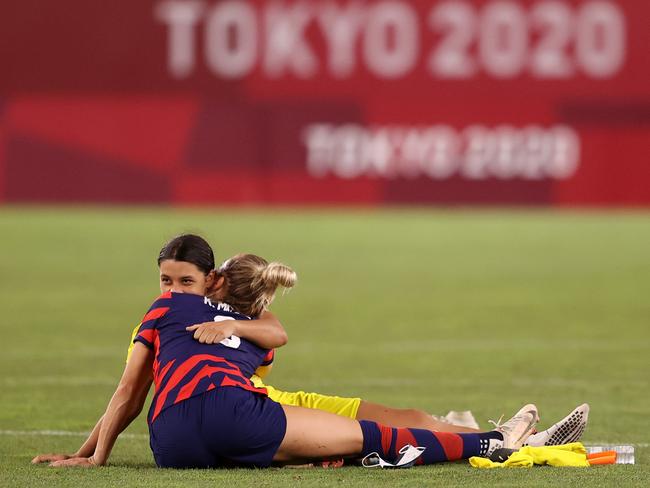 This photo after the Olympic bronze medal match sent the rumour mill into overdrive. (Photo by Francois Nel/Getty Images)