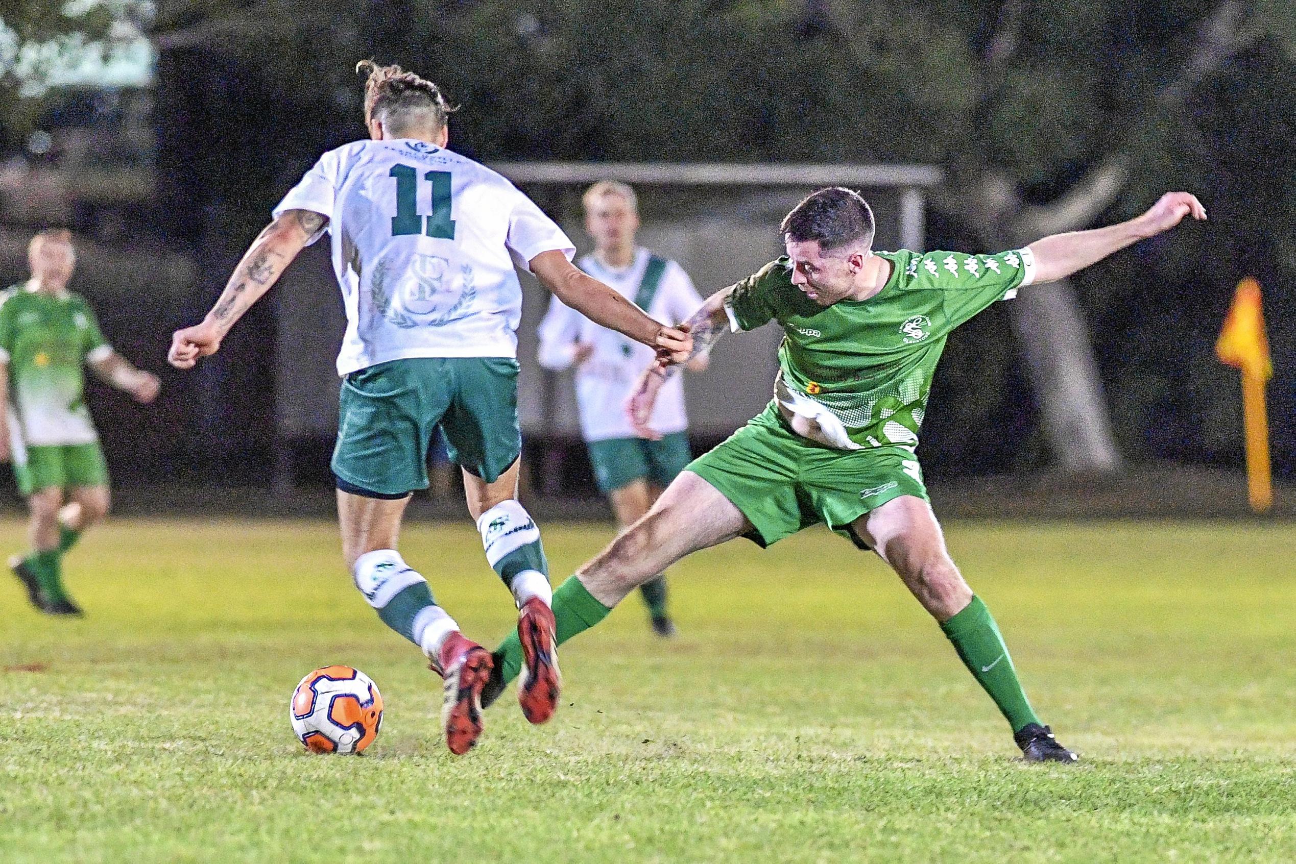 Clinton FC vs frenchville in the Central Queensland Premier League, division one. PICTURED: Clinton's Ryan Crawford and Frenchille's Jan Posch. Picture: Matt Taylor GLA030819SOCC