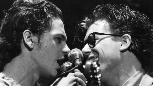 INXS lead singer Michael Hutchence and saxophonist Kirk Pengilly at Footy Park in 1985.