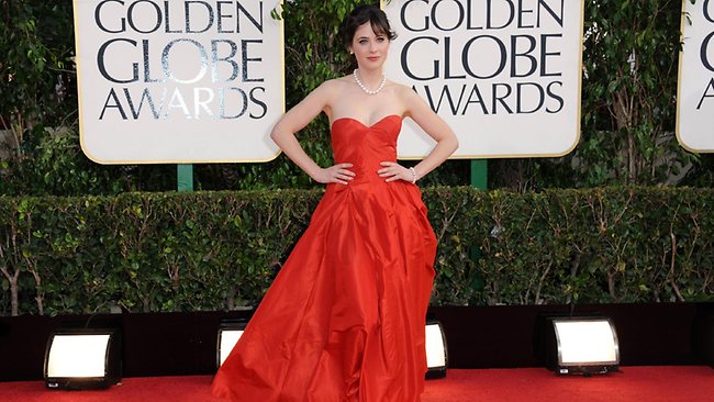 Actress Zooey Deschanel, here at the 2013 Golden Globes Awards, has received an apology after being wrongly identified as a supect in the Boston Marathon bombings.