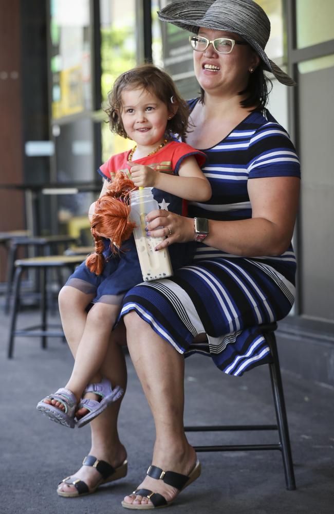 Summer Shen, 4, and mum Vivien Shen with a bubble tea in a reusable cup in Waterloo. Picture: Dylan Robinson