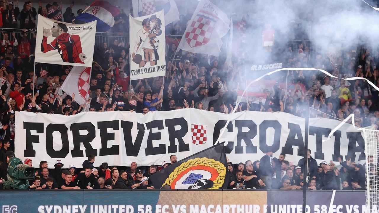 Sydney United fans enjoy the atmosphere during the Australia Cup final. Picture: Cameron Spencer/Getty Images