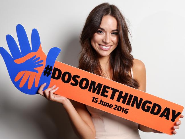 Monika Radulovic holding a #dosomethingday sign at the 2016 Go West awards night held at Bankstown Sports Club in Bankstown. Picture: Richard Dobson