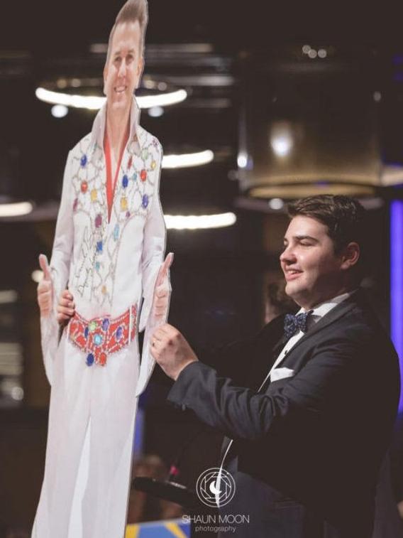 A life-size cut-out of LNP deputy leader Jarrod Bleijie – dressed as Elvis – is auctioned off at the 2024 Young Liberals federal convention in Brisbane.