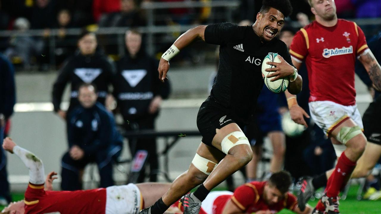 New Zealand’s Ardie Savea runs in a try against Wales in Wellington.