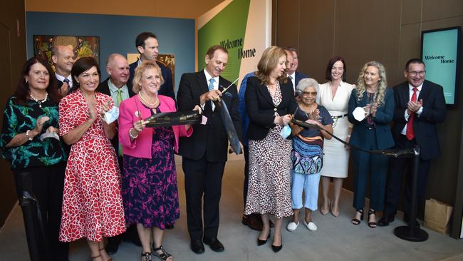 Rockhampton region councillors Grant Mathers, Neil Fisher, Senator Matt Canavan, Rockhampton MP Barry O'Rourke, Keppel MP Brittany Lauga, councillor Ellen Smith, Queensland Arts Minister Leeanne Enoch, Capricornia MP Michelle Landry, Mayor Tony Williams, Queensland Premier Annastacia Palaszczuk, Aunty Nikki, councillor Cherie Rutherford and councillor Drew Wickerson cut the ribbon of the opening of Rockhampton Museum of Art.