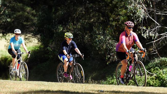 Katie Rowe, Nicky Ridgers, and Tina McCarthy are riding along the Gardiners Creek Trail, Burwood, near Deakin University. Picture: Steve Tanner