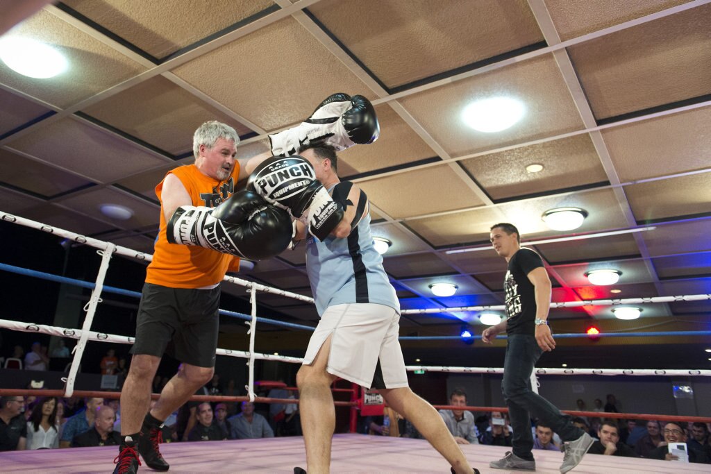 Fundraising bout participants John Geiger (left) and Nick Barker battle it out at Smithy and TGW Bring The Big Fights 14 at Rumours International, Saturday, October 22, 2016. Picture: Kevin Farmer