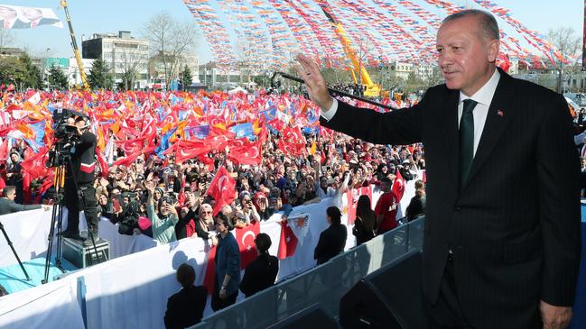 Turkish President Recep Tayyip Erdogan greets the crowd at a campaign rally ahead of March 31 local elections, in Sakarya on the Black Sea yesterday. Picture: AFP