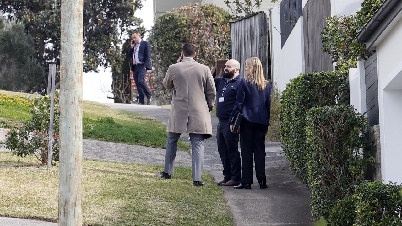 Detectives near the home of John Ibrahim at Dover Heights in Sydney. Picture: Richard Dobson