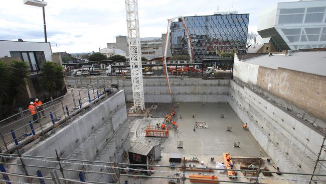 The long-awaited Geelong Quarter project is a step closer as a large crane was erected at the site. The crane will be onsite for about 12 months as builders develop the $200 million project, home to the Holiday Inn hotel Ryrie Residences and Ryrie Home apartments. Picture: Alan Barber