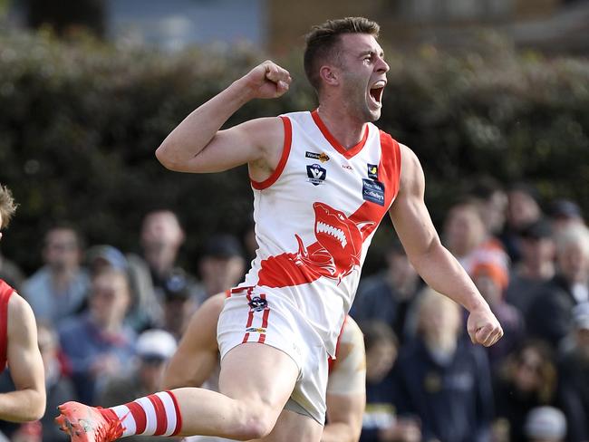 James Hallahan celebrates a goal during the MPNFL Division 1 grand final between The Pines and Sorrentoin Frankston, Sunday, Sept. 16, 2018. Picture: Andy Brownbill)