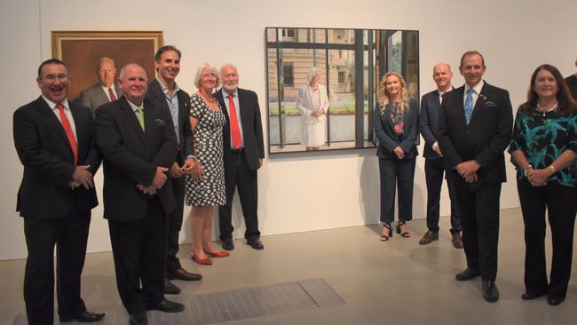 Councillors Drew Wickerson, Neil Fisher, artist Michael Zavros, Margaret and Darryl Strelow, Cr Cherie Rutherford, Cr Grant Mathers, Mayor Tony Williams and Cr Ellen Smith in front of the new painting.