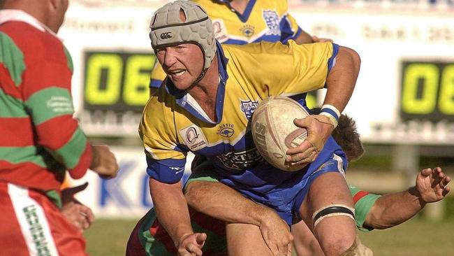 Noosa&#39;s Greg Christensen is attacked by Nambour&#39;s defence in their match at Nambour. Picture: Lou O'Brien