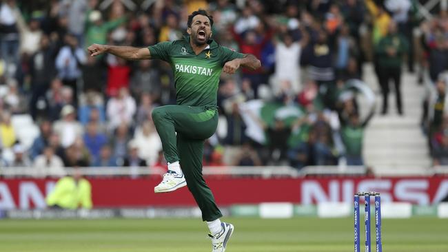 Pakistan's Wahab Riaz celebrates taking the wicket of England's Chris Woakes. Picture: AP