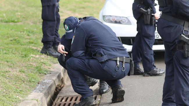 Police and forensics at the scene of the shooting in Wentworthville.