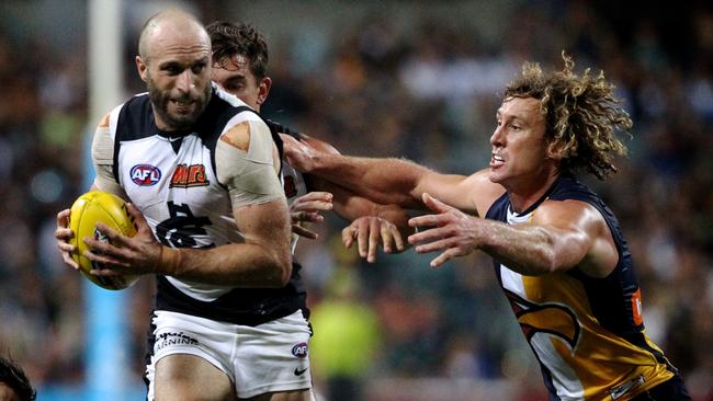 Chris Judd leading Carlton against his old club, the West Coast Eagles, in 2015. Picture: AAP