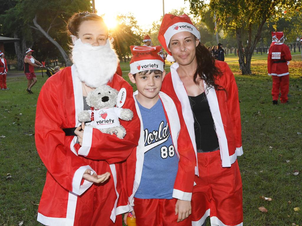 Maddison McCormick, Ryan McCormick and Bernice McCormick at the Darwin Santa Fun Run in July at Mindil Beach. Picture Katrina Bridgeford