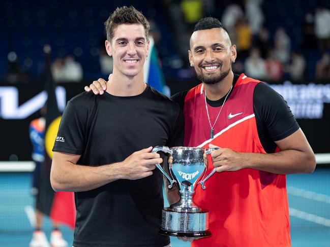 Thanasi Kokkinakis and Nick Kyrgios after winning the Australian Open men's doubles final in 2022. Picture: Bai Xuefei/Xinhua via Getty Images
