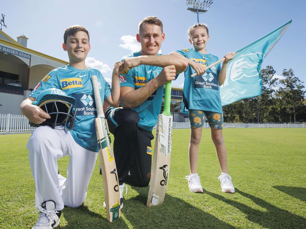 Labuschagne celebrates his new Heat deal with young fans Hudson, 10, and Amayah, 8, at Allan Border Field. Picture: Lachie Millard