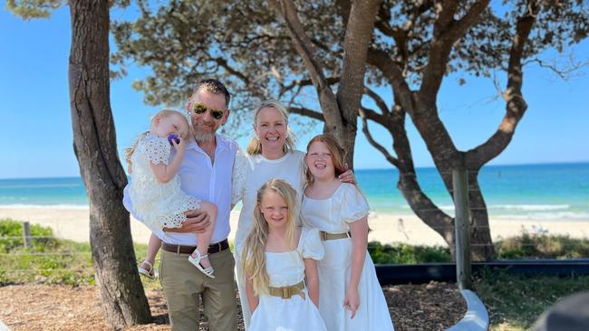 Neil Johns with his family - his partner Melissa and children Isabella, Lily and Madison. Picture: Supplied