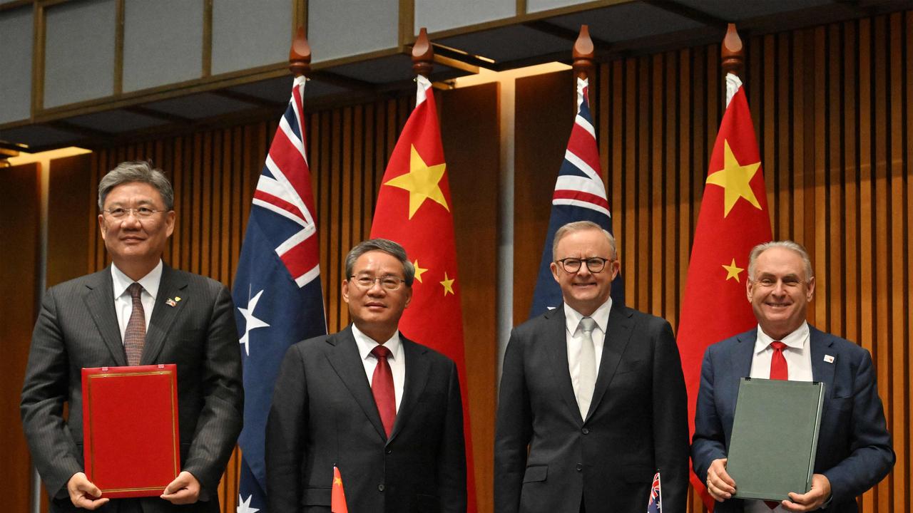 China's Minister of Commerce Wang Wentao and Premier Li Qiang with Prime Minister Anthony Albanese and Minister for Trade Don Farrell during an agreements signing ceremony at Parliament House this year. Picture: Mick Tsikas/Pool/AFP