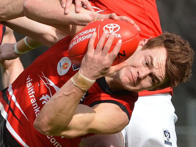 VFL Football: Coburg V Frankston.  Frankston player Josh Tynan takes a strong mark.  Picture : Adam Elwood