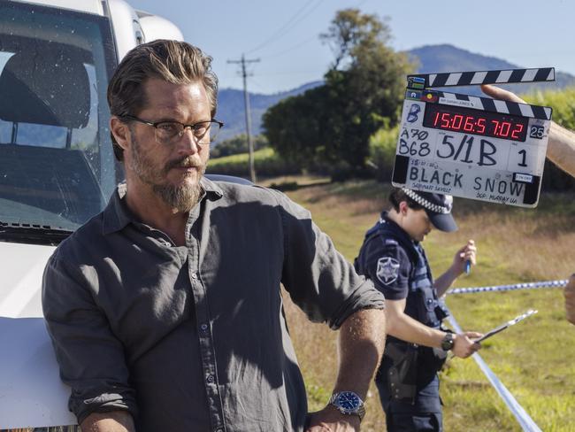 behind-the-scenes photos from the Stan original Black Snow. Travis Fimmel (Cormack)